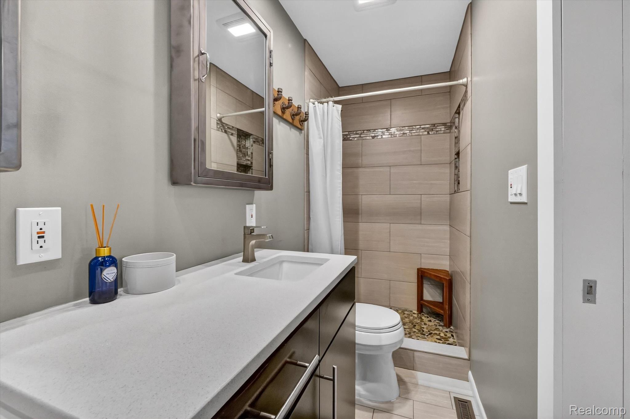 2264 Crane Road Fenton, MI 48430 - Photo 30 of 55 Full bath featuring a stall shower and vanity