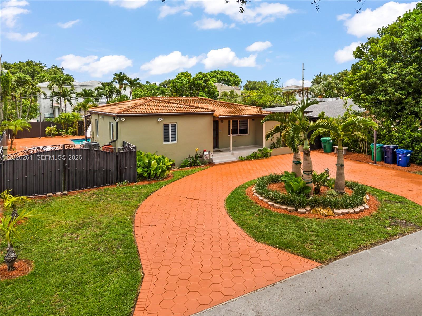 6250 Southwest 20th Terrace Miami, FL 33155 - Photo 2 of 42 a view of a backyard with a garden