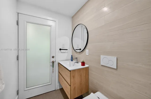 a view of a patio with a table and chairs