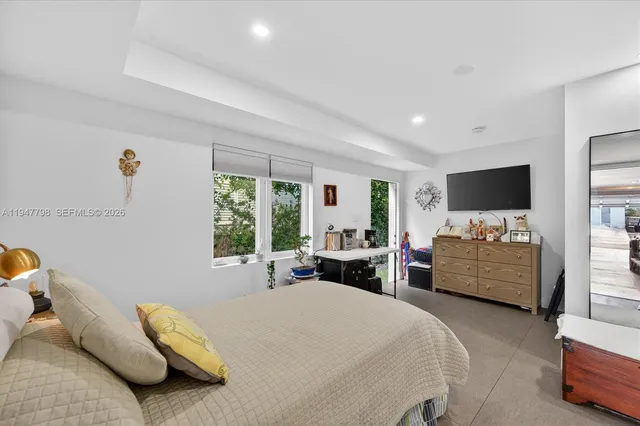 a view of a garage and car parked