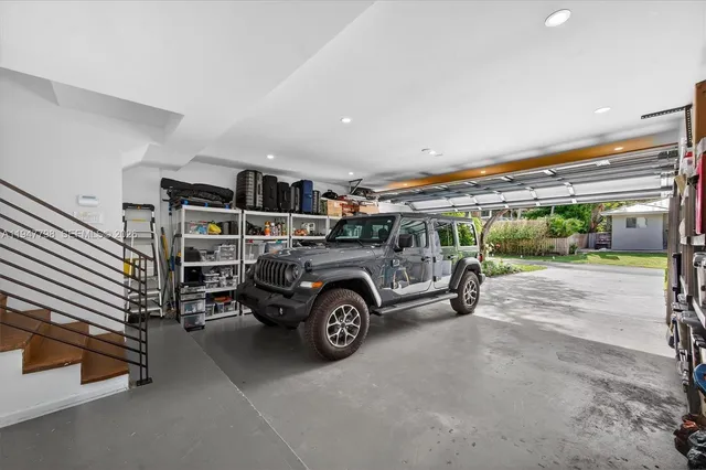 a view of a backyard with potted plants