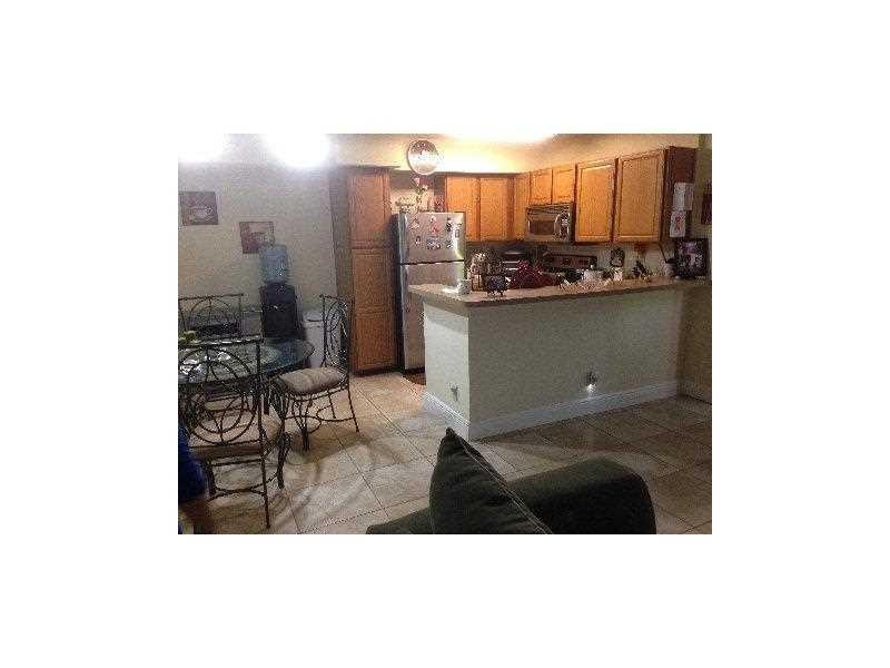 621 Lyons Road, Unit 9103 Coconut Creek, FL 33063 - Photo 5 of 9 Kitchen