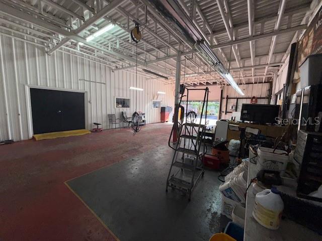 644 Maguire Road Ocoee, FL 34761 - Photo 10 of 37 a view of a room with gym equipment