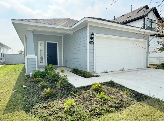 a view of a back yard of the house