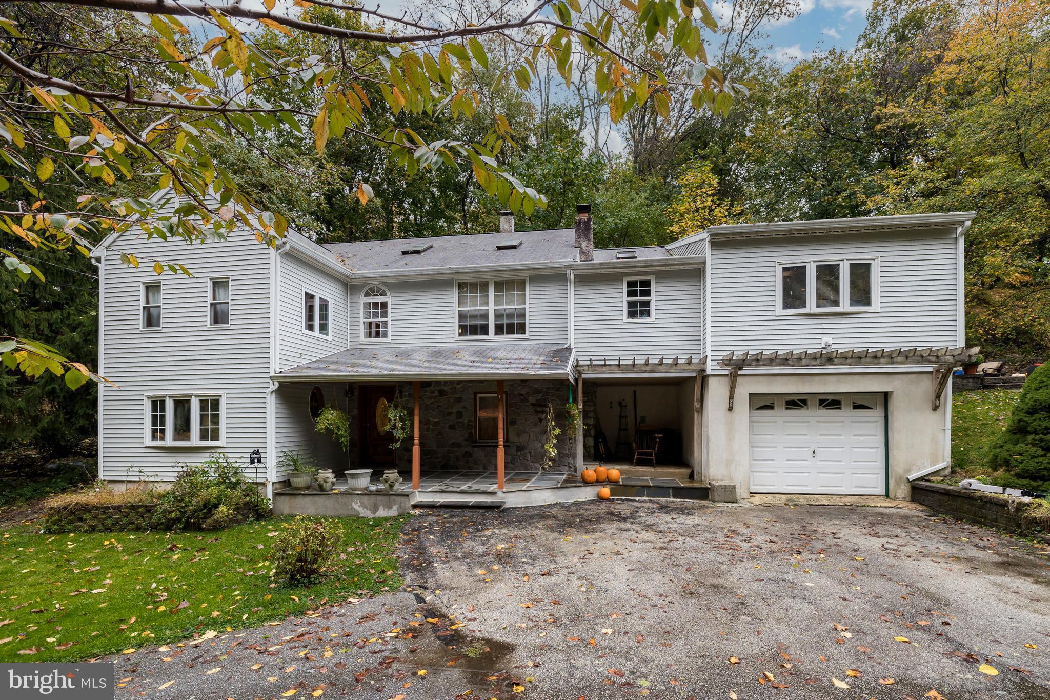 29 Hollow Road Paoli, PA 19301 - Photo 1 of 22 Front Exterior with covered Porch