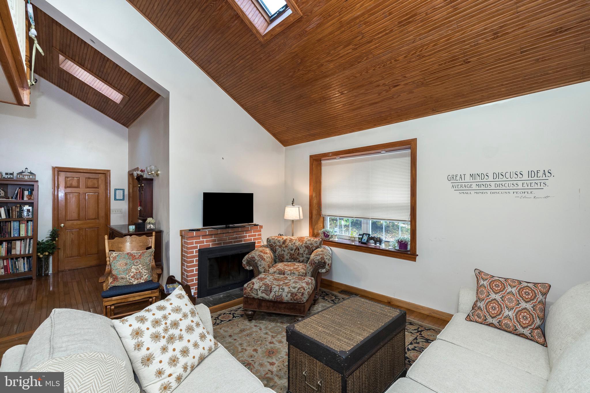 29 Hollow Road Paoli, PA 19301 - Photo 6 of 22 Living Room with Vaulted Ceiling and FP