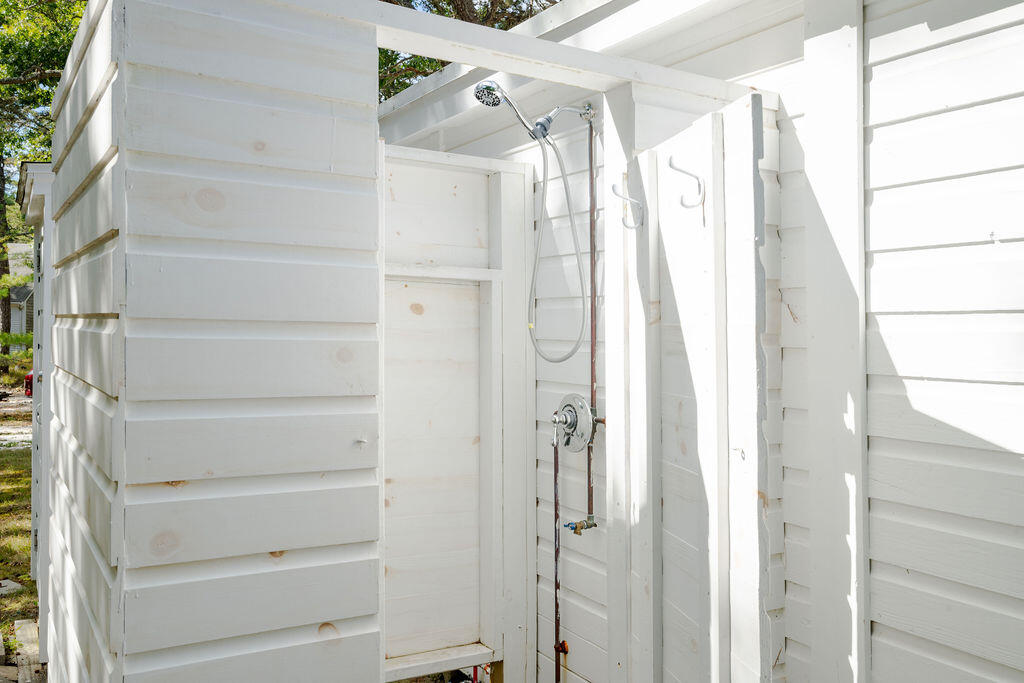 1937 State Highway Route 6, Unit E Eastham, MA 02642 - Photo 13 of 20 a view of walk in closet with empty racks