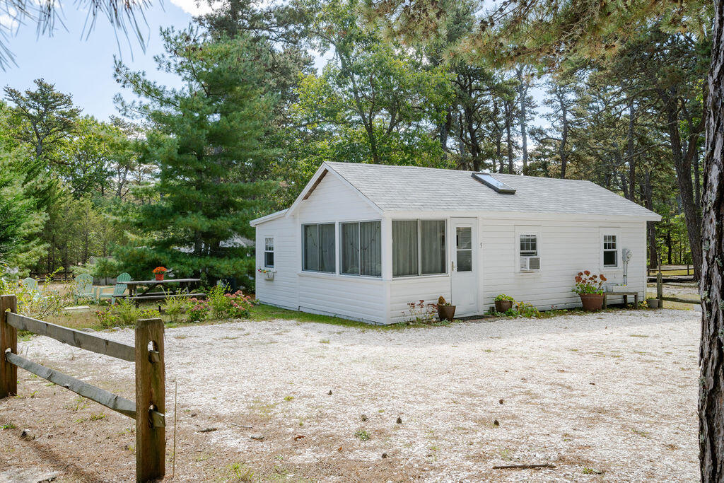 1937 State Highway Route 6, Unit E Eastham, MA 02642 - Photo 19 of 20 a view of a house with backyard and sitting area