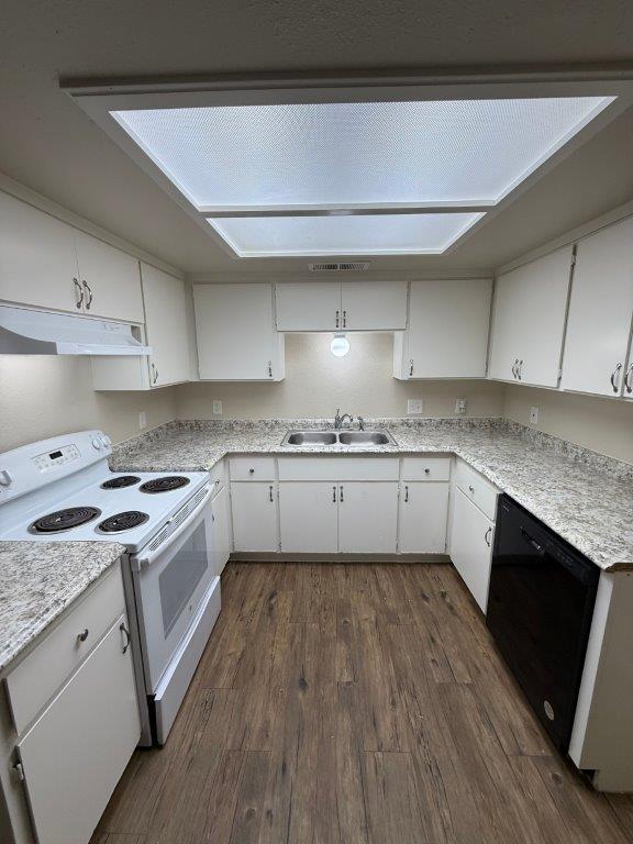 1405 East Cypress Avenue Reedley, CA 93654 - Photo 15 of 29 a white kitchen with granite countertop stainless steel appliances