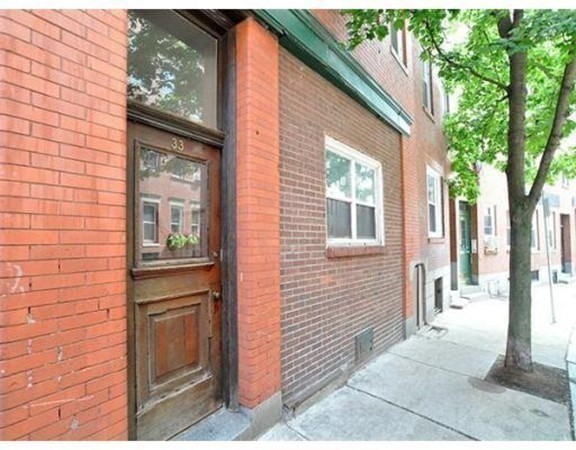 33 Charter Street, Unit 1 Boston, MA 02113 - Photo 14 of 15 a front view of a house with a tree