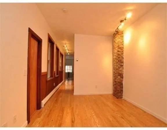 a view of hallway with stairs