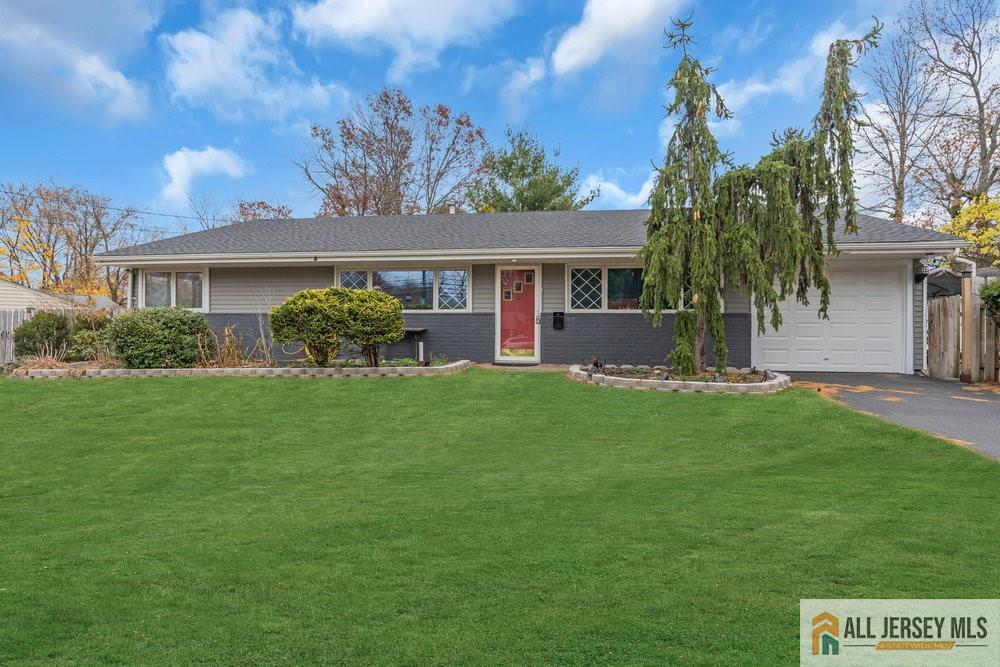 36 New Road Kendall Park, NJ 08824 - Photo 1 of 30 a front view of house with yard and green space