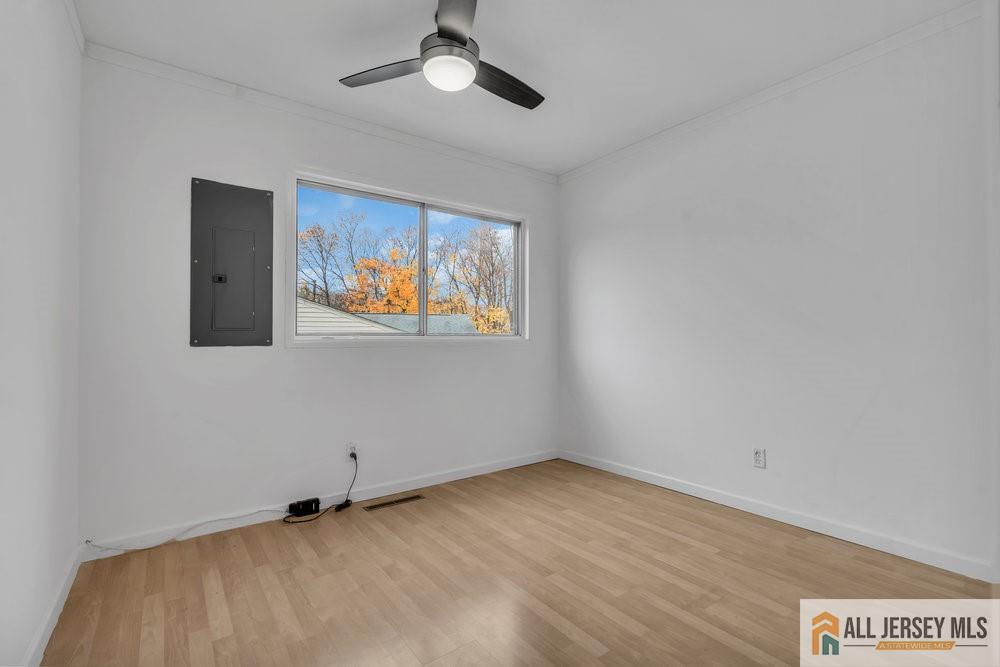 36 New Road Kendall Park, NJ 08824 - Photo 15 of 30 a view of an empty room with a window