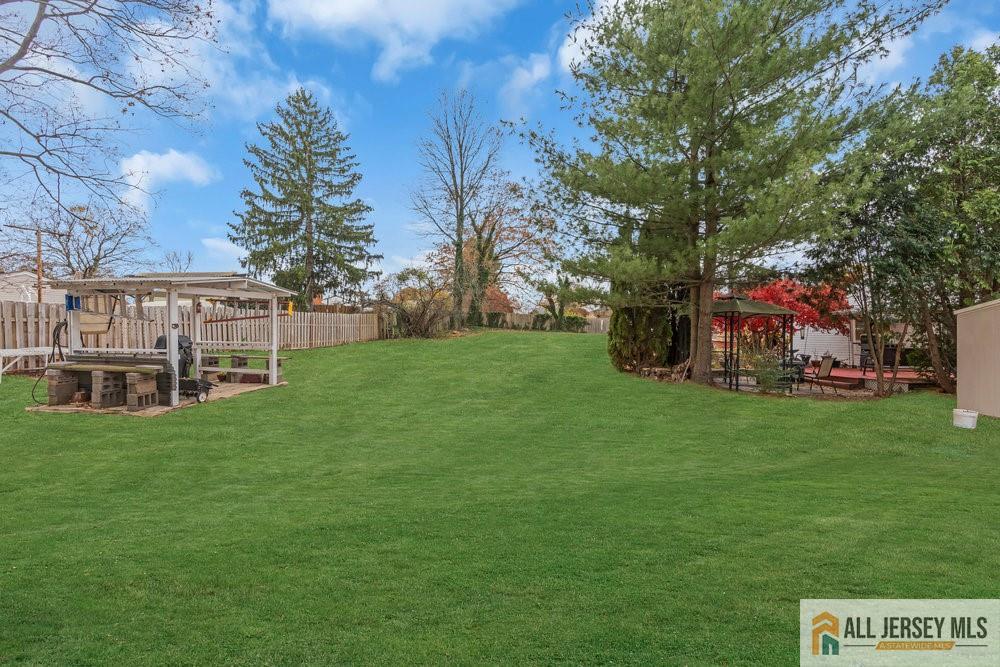 36 New Road Kendall Park, NJ 08824 - Photo 29 of 30 a view of a house with a big yard