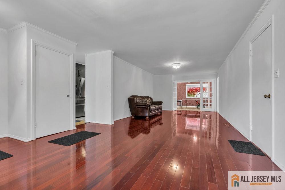 36 New Road Kendall Park, NJ 08824 - Photo 3 of 30 a living room with furniture and a wooden floor
