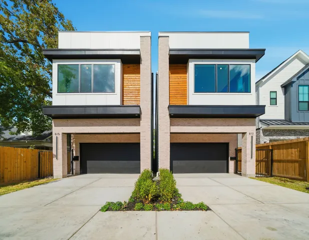 a front view of a house with yard
