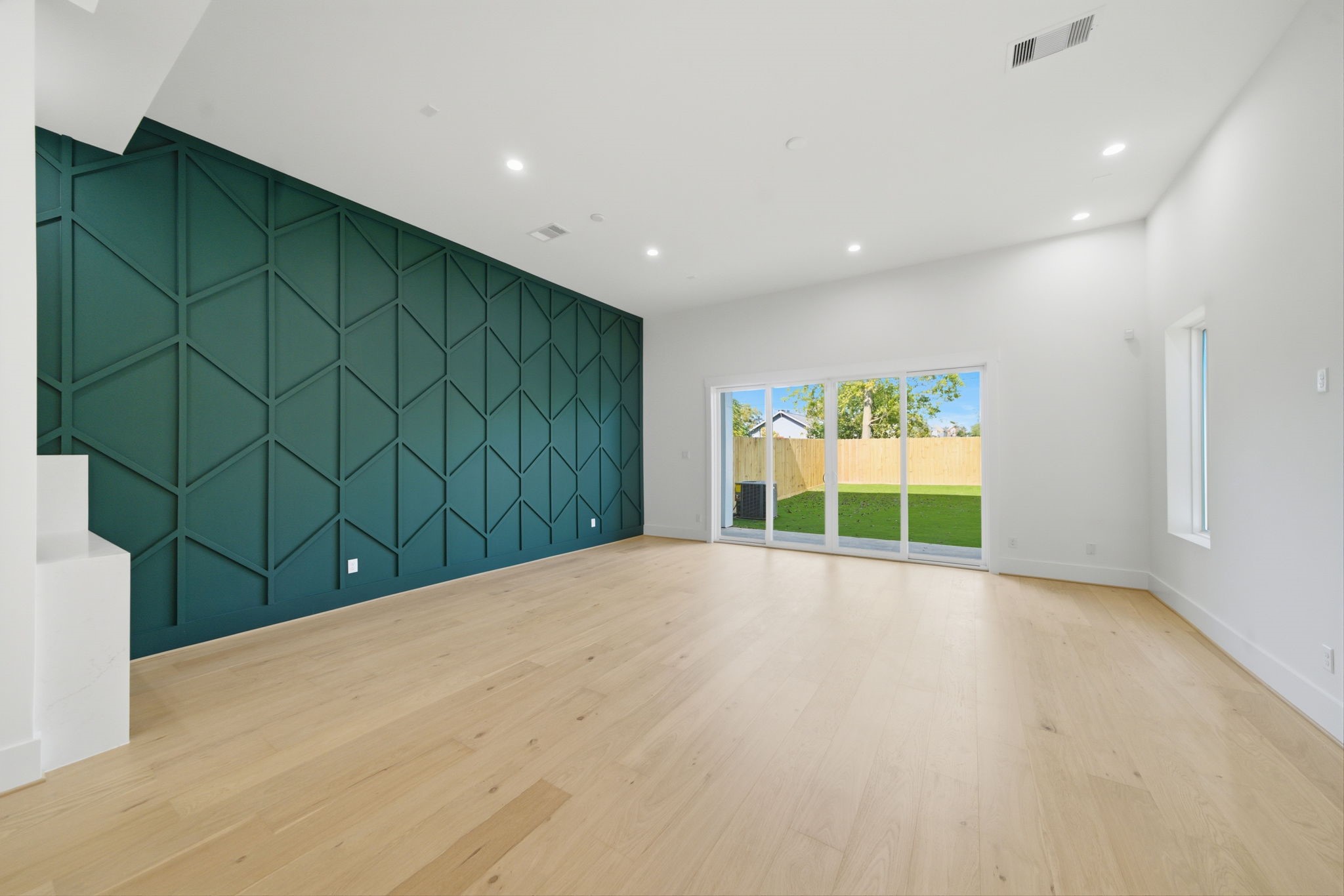 1227 Prince Street Houston, TX 77008 - Photo 12 of 35 a view of an empty room with a window