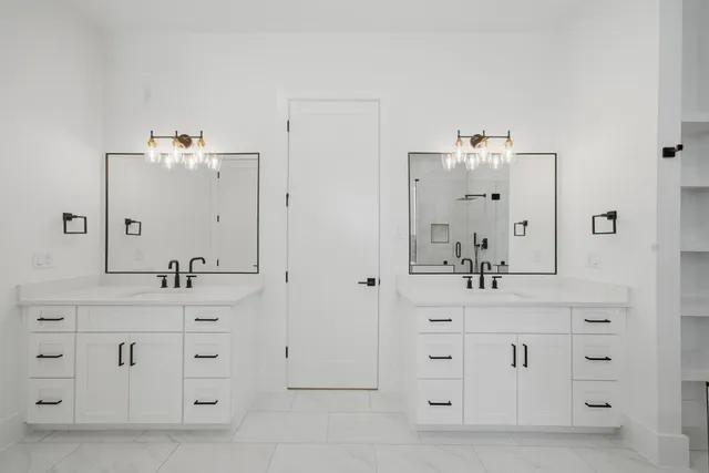 wooden floor with white cabinets