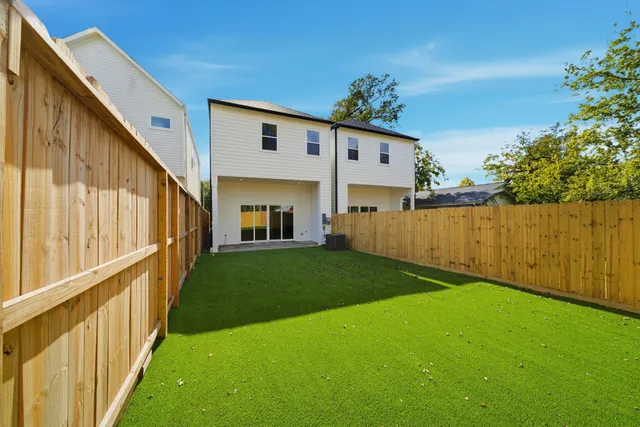 a view of a back yard of the house
