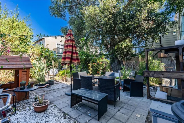 a outdoor living space with furniture and city view