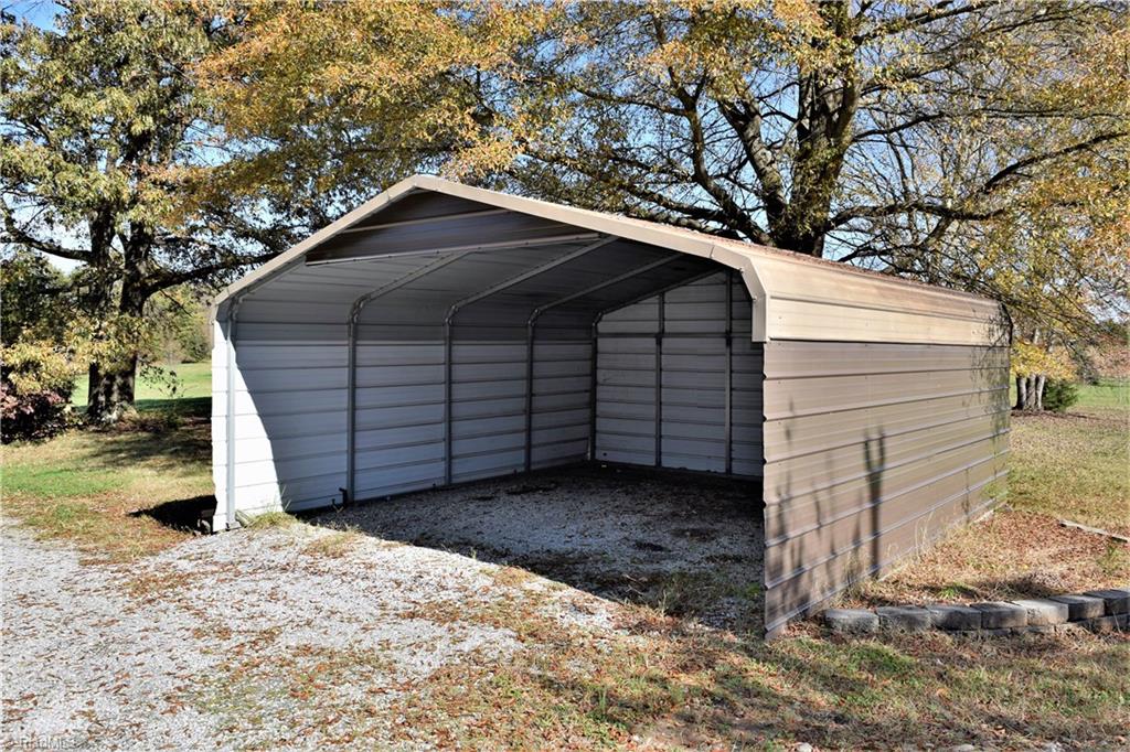 7936 Lester Road Stokesdale, NC 27357 - Photo 24 of 30 20x18 carport