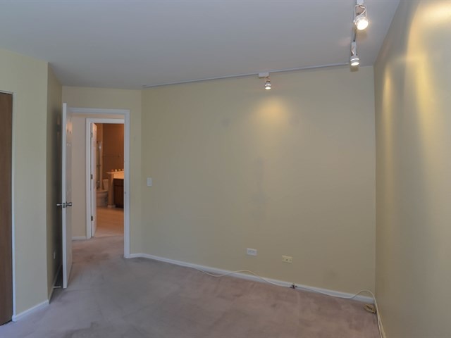 994 Ridgefield Lane, Unit 994 Wheeling, IL 60090 - Photo 18 of 19 a view of empty room