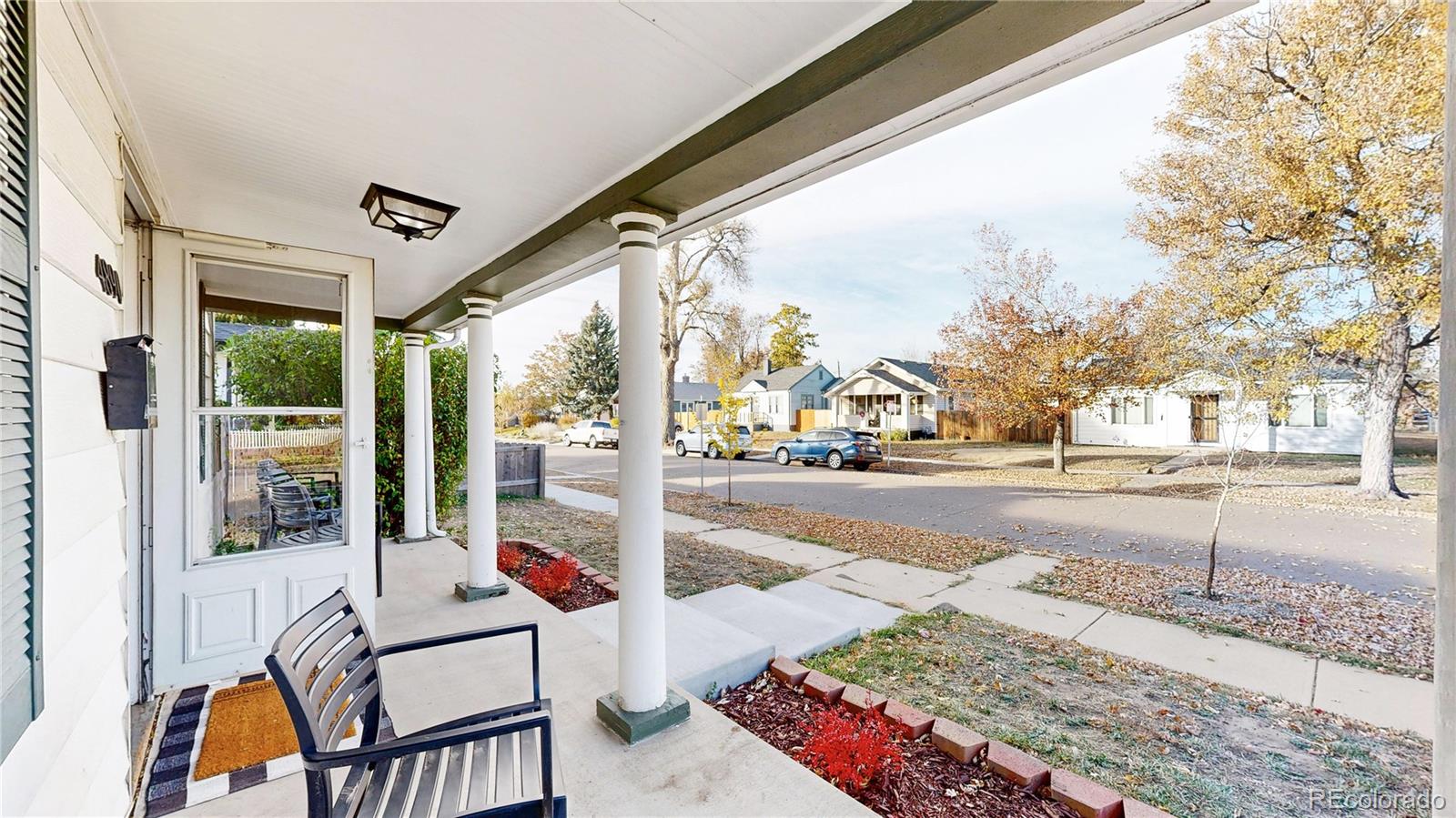 4890 Irving Street Denver, CO 80221 - Photo 23 of 35 a view of a porch with a sitting area