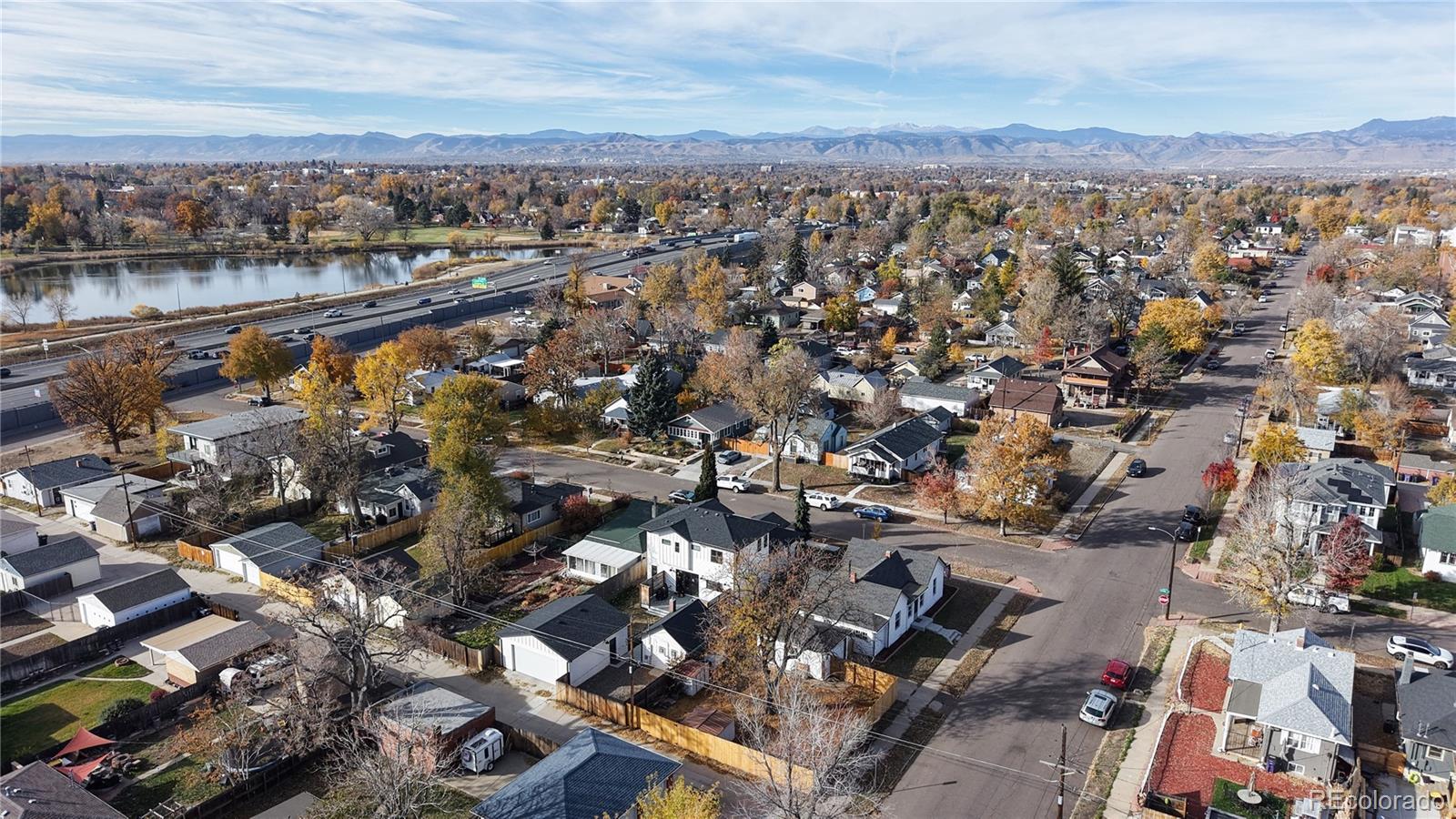 4890 Irving Street Denver, CO 80221 - Photo 34 of 35 an aerial view of a city with mountains
