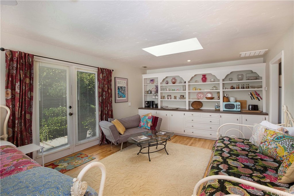 2915 Lakemont Drive Fallbrook, CA 92028 - Photo 30 of 56 a living room with furniture and a floor to ceiling window