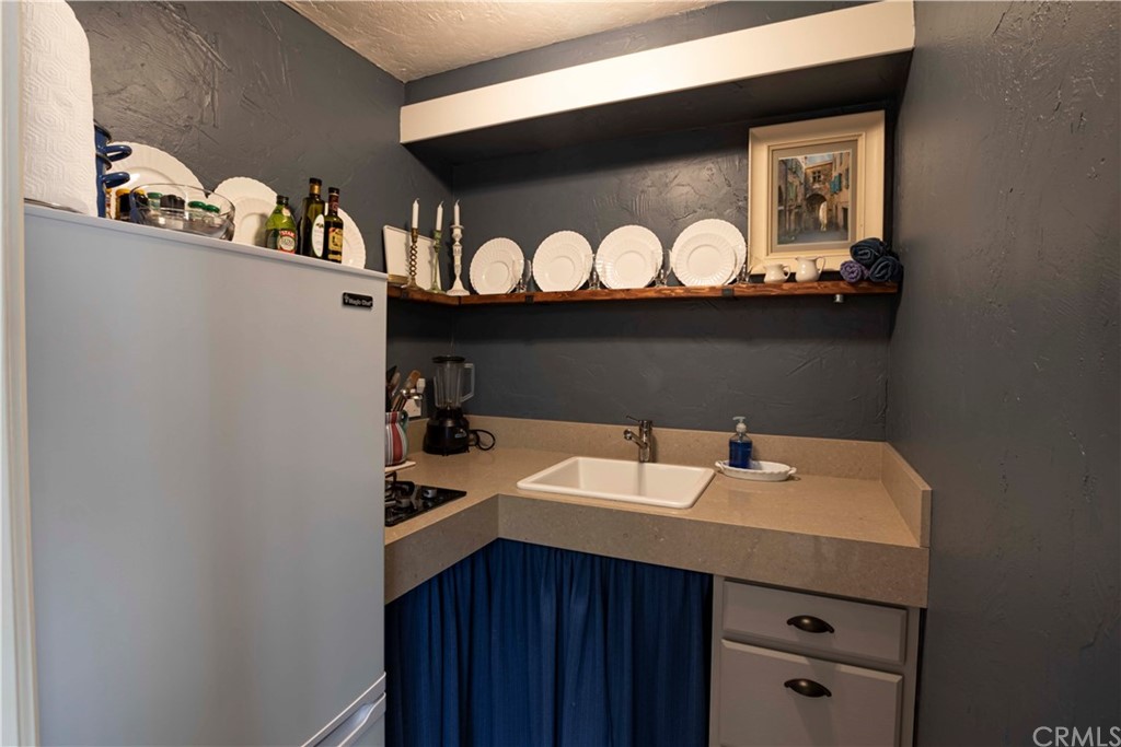 2915 Lakemont Drive Fallbrook, CA 92028 - Photo 33 of 56 a bathroom with a sink and a mirror
