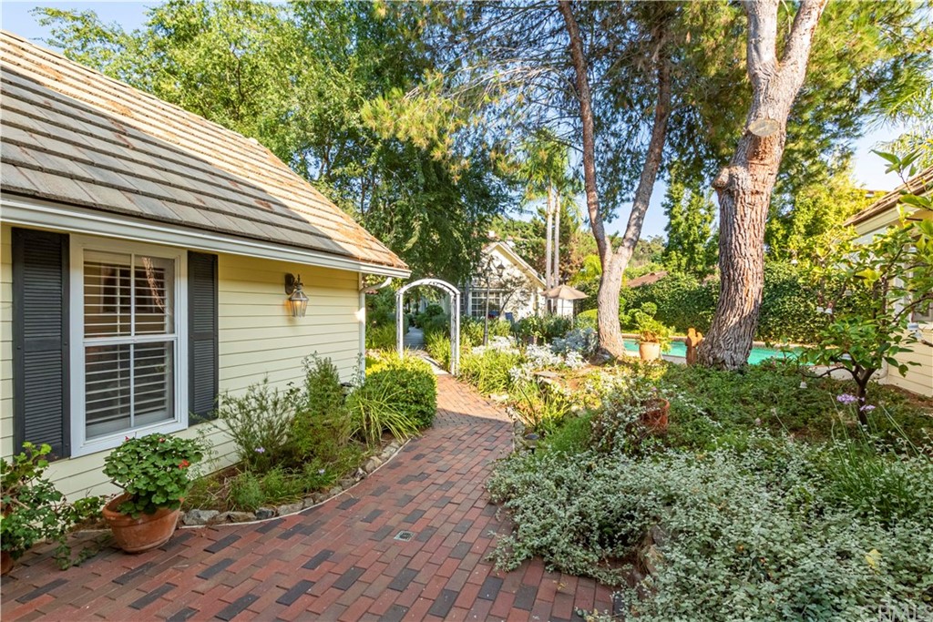 2915 Lakemont Drive Fallbrook, CA 92028 - Photo 34 of 56 a front view of a house with garden