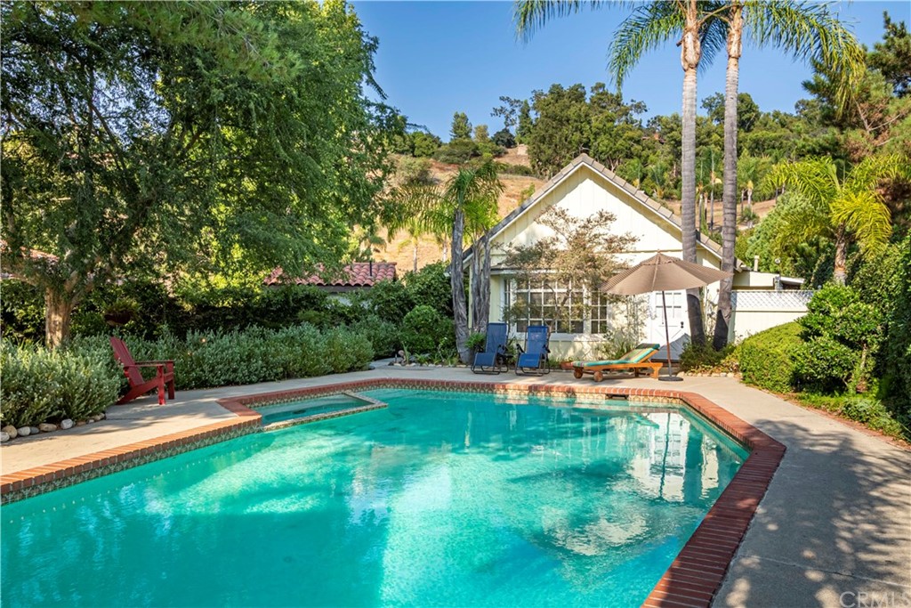 2915 Lakemont Drive Fallbrook, CA 92028 - Photo 35 of 56 a view of a house with swimming pool and sitting area