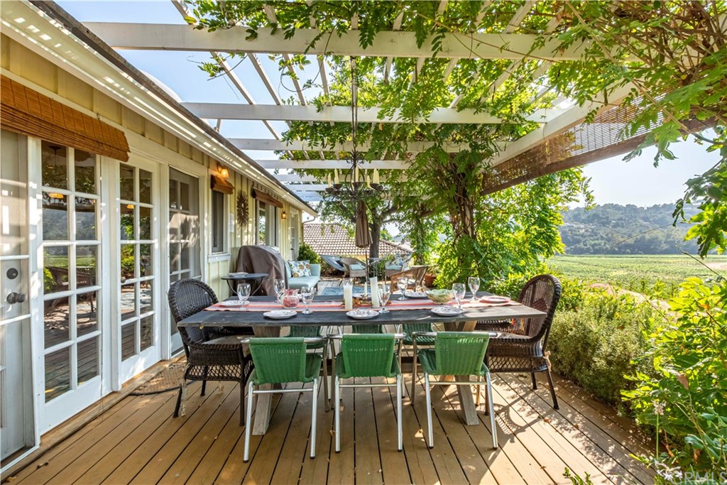 2915 Lakemont Drive Fallbrook, CA 92028 - Photo 38 of 56 a view of patio with table and chairs and potted plants