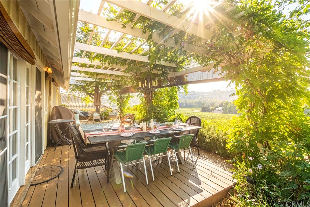 2915 Lakemont Drive Fallbrook, CA 92028 - Photo 40 of 56 a dining room with furniture and wooden floor