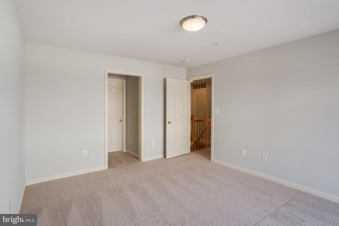 12093 Trumbull Way, Unit 20931 Reston, VA 20190 - Photo 20 of 32 Master bedroom