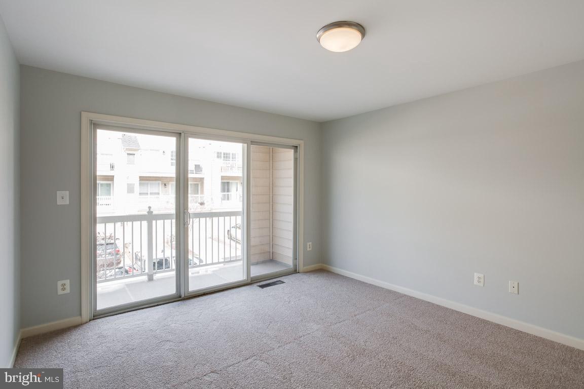 12093 Trumbull Way, Unit 20931 Reston, VA 20190 - Photo 21 of 32 Master bedroom