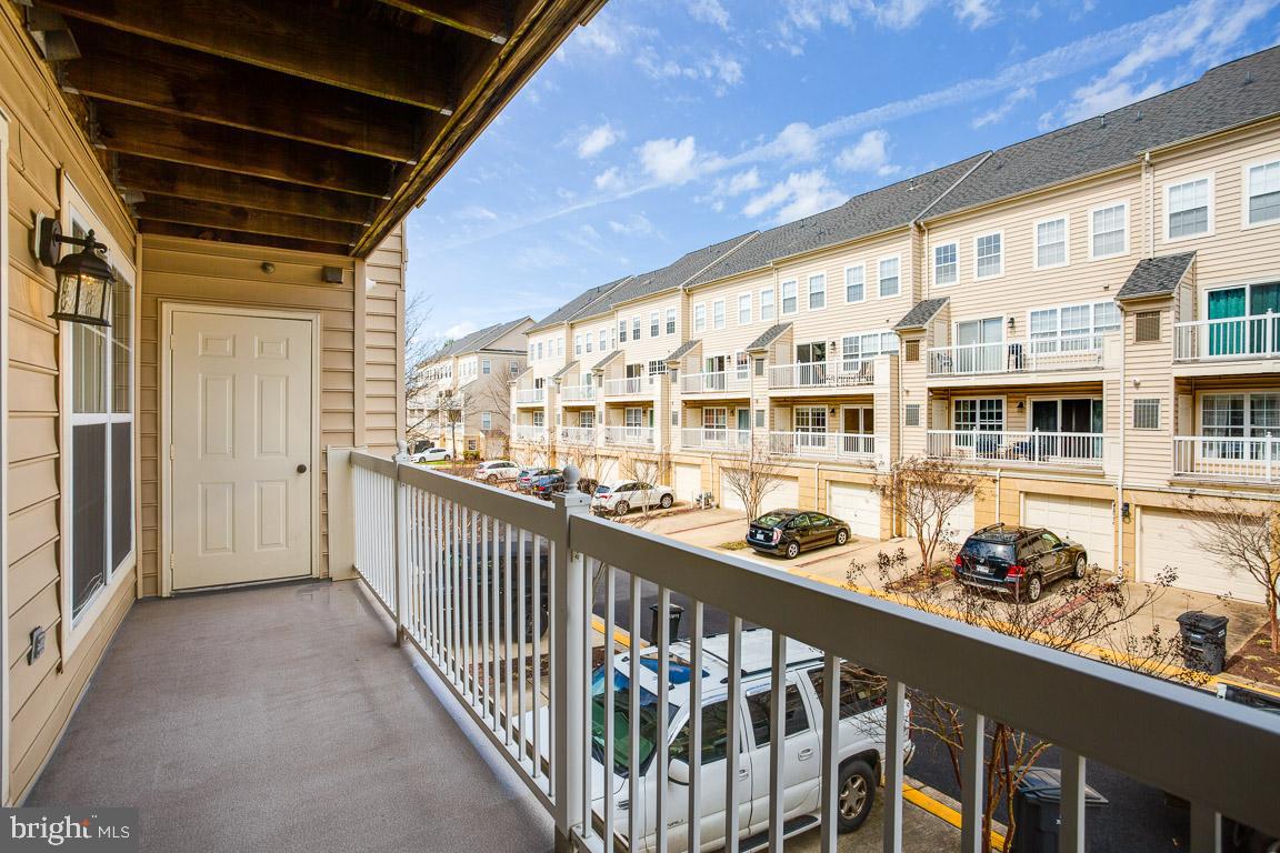 12093 Trumbull Way, Unit 20931 Reston, VA 20190 - Photo 22 of 32 Balcony off Master Bedroom