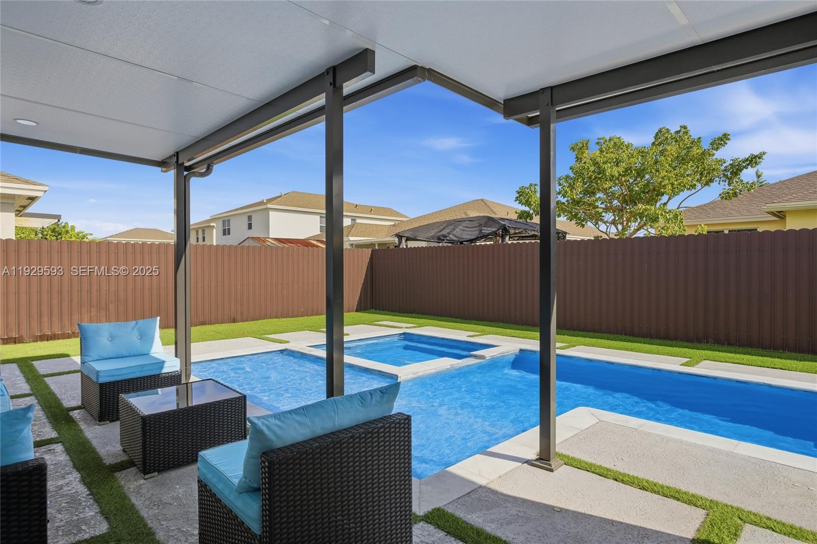 27641 Southwest 134th Court Homestead, FL 33033 - Photo 12 of 40 a view of an outdoor space with swimming pool