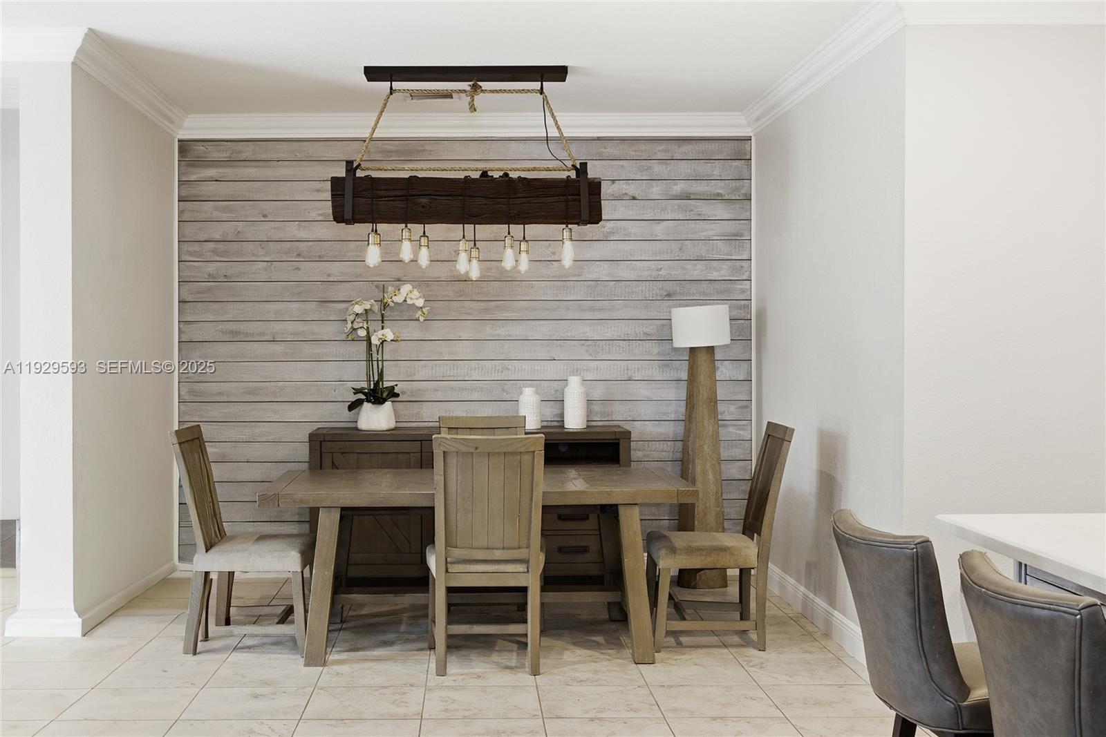 27641 Southwest 134th Court Homestead, FL 33033 - Photo 18 of 40 a view of a dining room with furniture