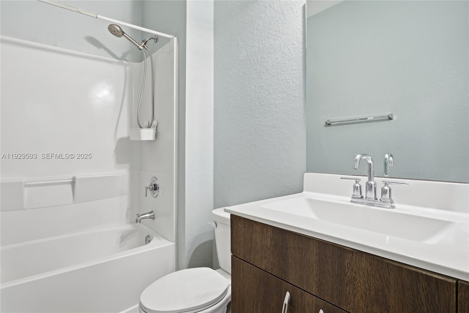 27641 Southwest 134th Court Homestead, FL 33033 - Photo 30 of 40 a bathroom with a sink a toilet and shower