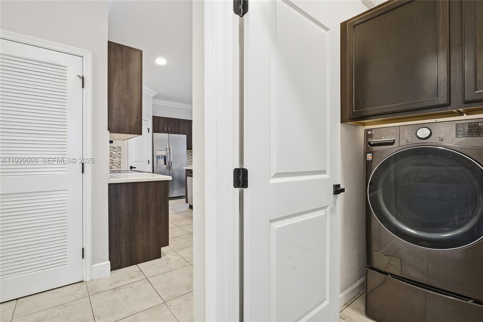 27641 Southwest 134th Court Homestead, FL 33033 - Photo 31 of 40 a bathroom with a sink and a mirror
