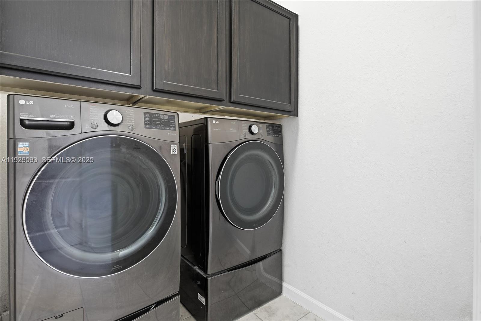 27641 Southwest 134th Court Homestead, FL 33033 - Photo 32 of 40 a utility room with dryer and washer