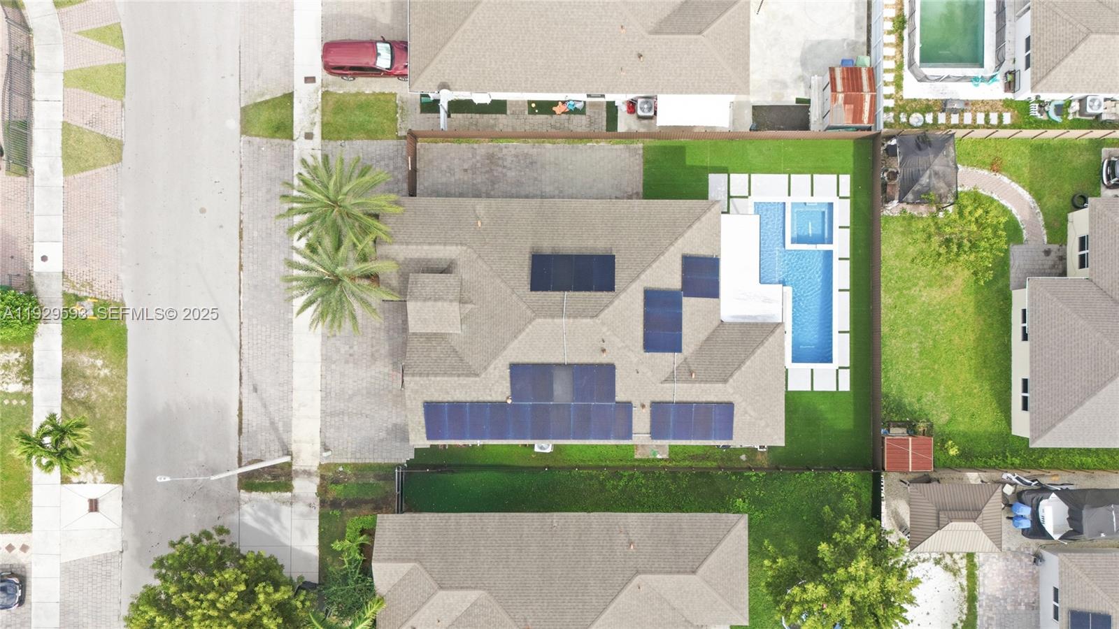 27641 Southwest 134th Court Homestead, FL 33033 - Photo 34 of 40 a aerial view of a house with a garden and plants