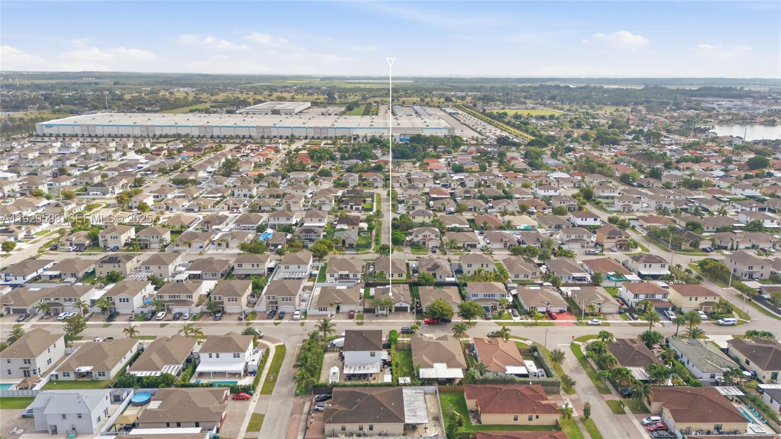 27641 Southwest 134th Court Homestead, FL 33033 - Photo 40 of 40 an aerial view of a city with lots of residential buildings