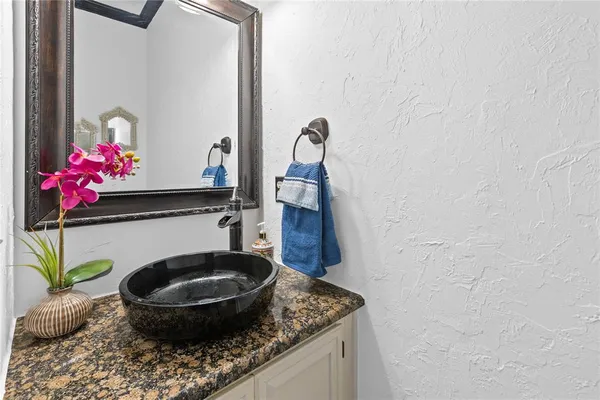 a kitchen with a stove and a sink