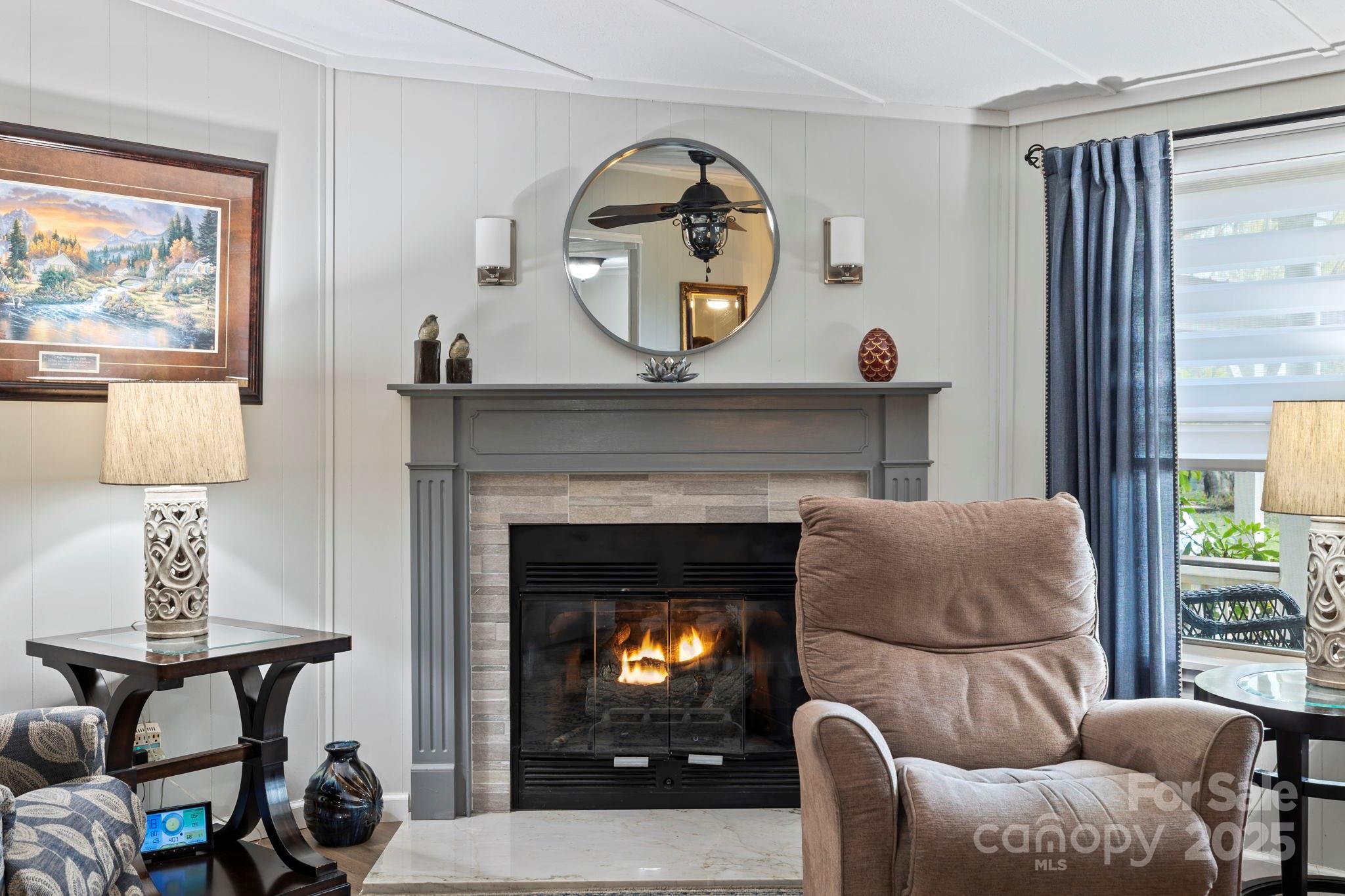 12 Timbers Edge Lane Fairview, NC 28730 - Photo 20 of 35 a living room with furniture and a fireplace