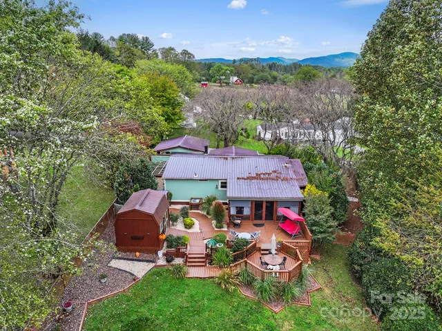 a view of a patio with wooden floor