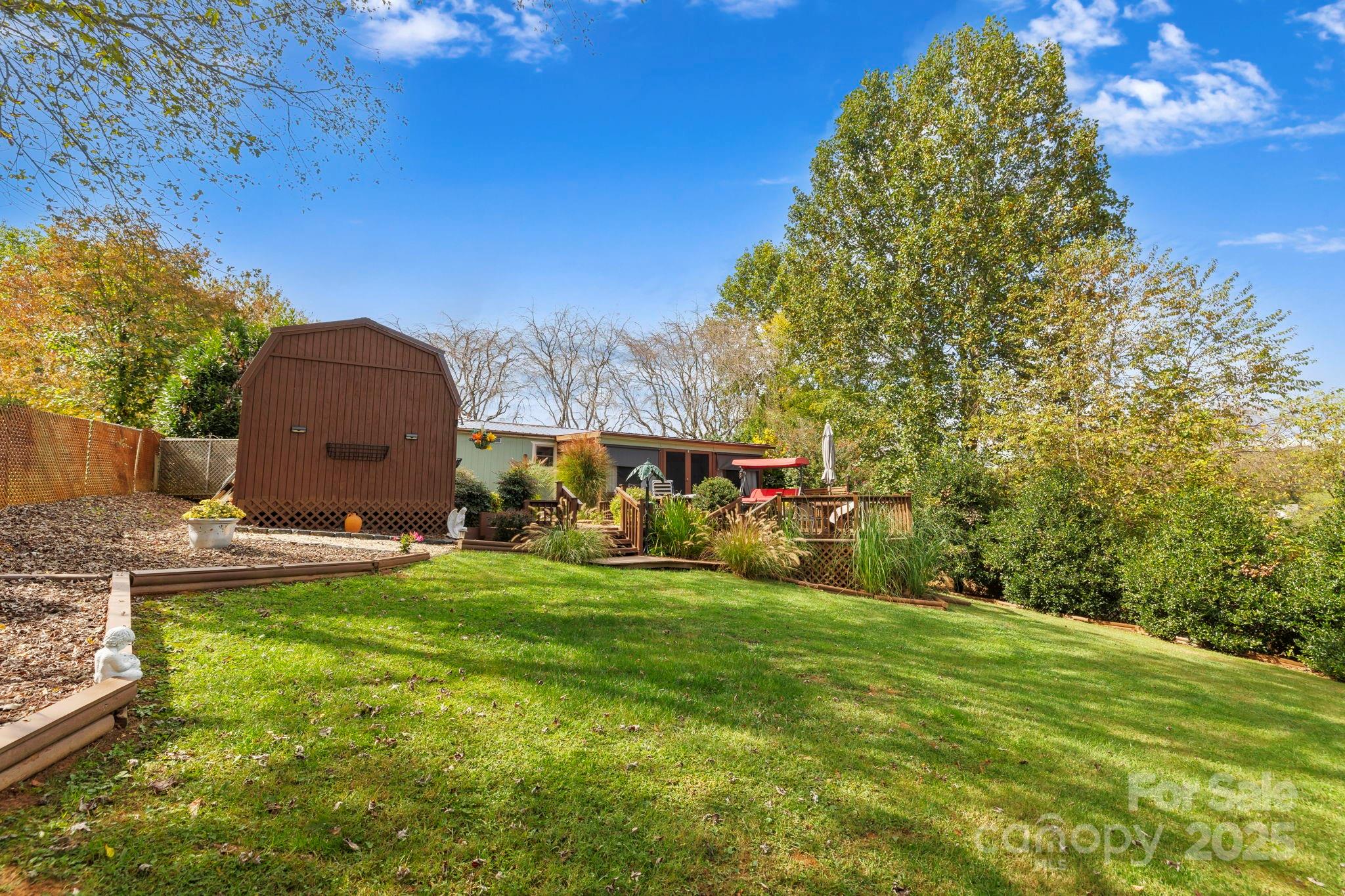12 Timbers Edge Lane Fairview, NC 28730 - Photo 6 of 35 a view of a back yard