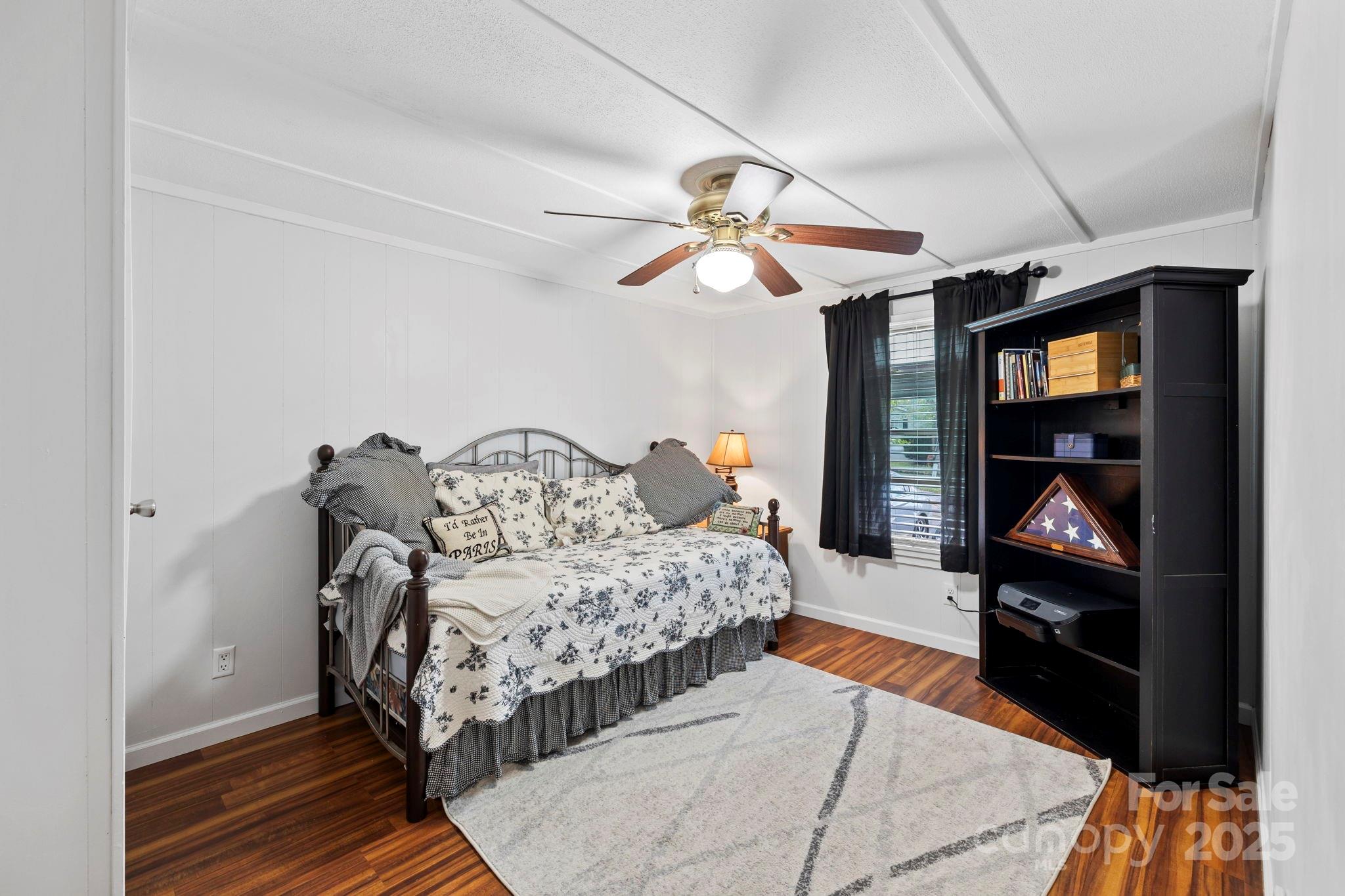 12 Timbers Edge Lane Fairview, NC 28730 - Photo 10 of 35 a bedroom with a bed and a walk in closet