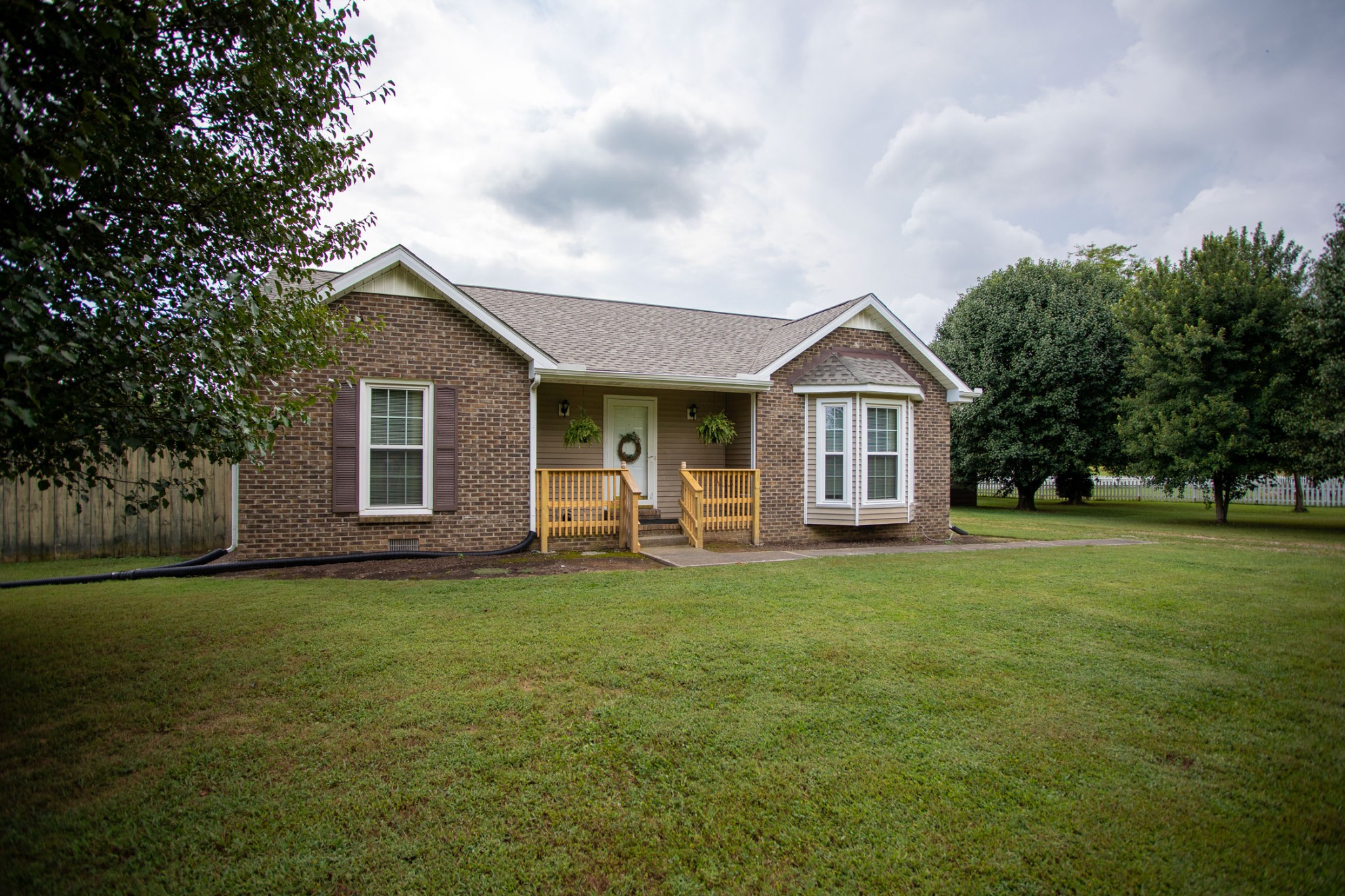4971 Hyde Road Springfield, TN 37172 - Photo 1 of 36 a front view of a house with a garden